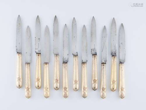 A set of Louis XVI style cheese knives