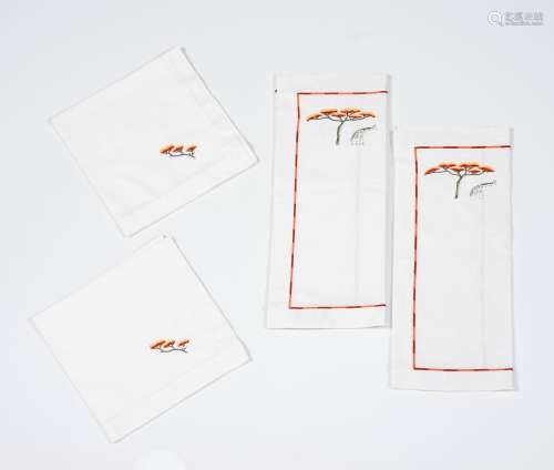 A pair of placemats with napkins