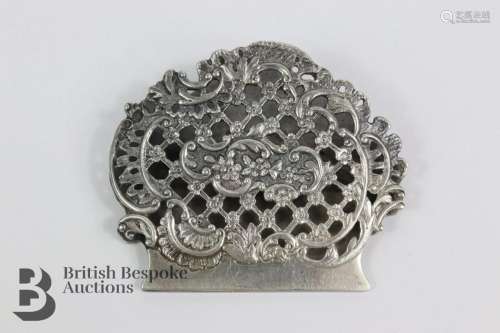 Silver ornate paper clip