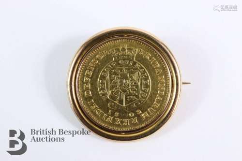 George III 1809 gold half guinea in a 9ct gold mount