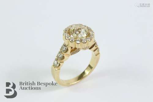 14ct yellow gold ring. The ring set with a central diamond 7...