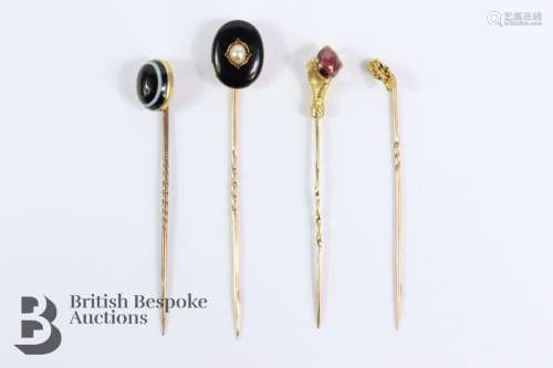 Collection tie pins incuding a gold claw set tie pin set wit...