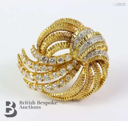 18ct yellow gold and diamond brooch. The brooch set with app...