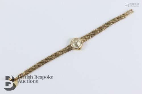 Ladies 9ct gold Omega wrist watch. The watch having a champa...