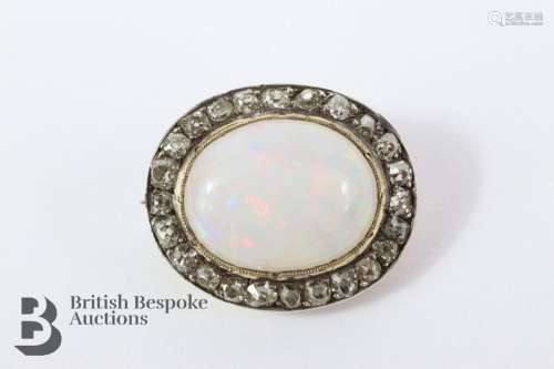 Antique 9ct and silver diamond and opal brooch. The brooch s...