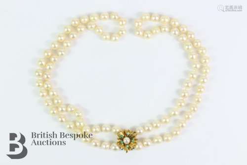 Double strand pearl necklace. The necklace set with eighty-s...