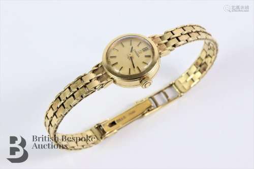 Lady's 9ct yellow gold Omega wrist watch. The wrist watch ha...