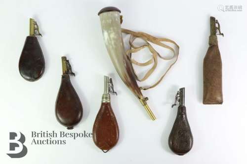 Five assorted leather shot flasks