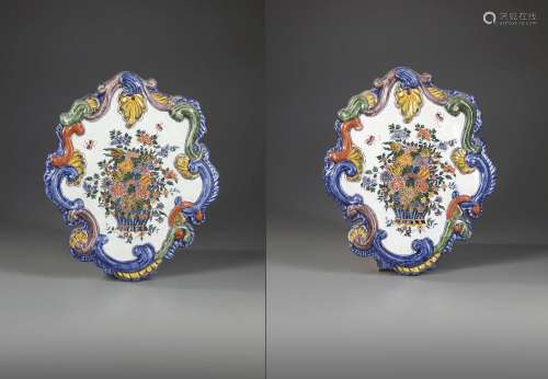 A PAIR OF MIXED TECHNIQUE POLYCHROME DELFT PLAQUES, MID 18TH...