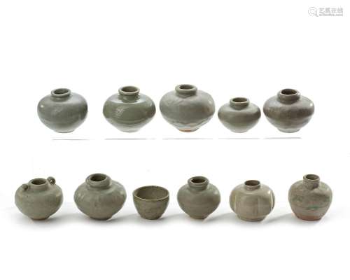 NINE SMALL CHINESE CELADON JARS AND A CUP, 13TH-14TH CENTURY