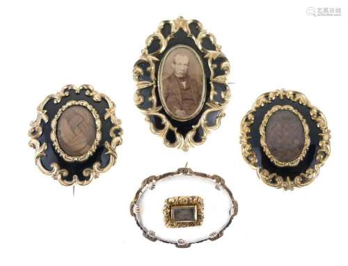 Collection of four Victorian mourning brooches