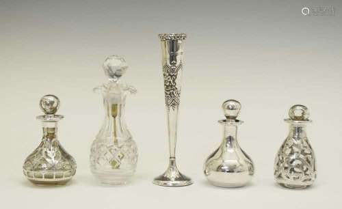 Four scent bottles and posy vase