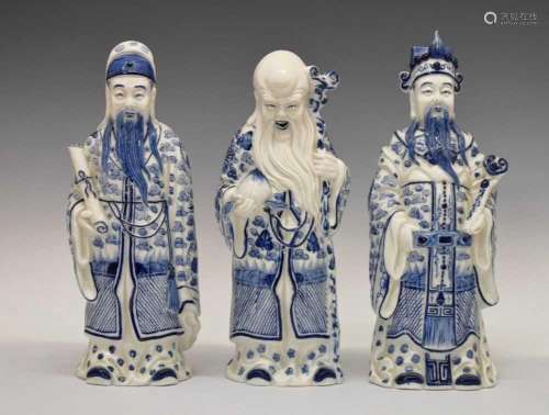 Set of three Chinese blue and white porcelain Sanxing figure...