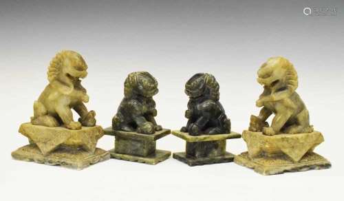 Pair of Chinese carved green soapstone Dogs of Fo