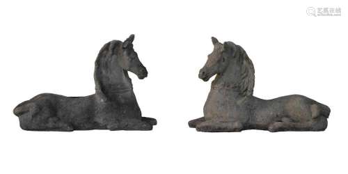 Pair of composition recumbent horses
