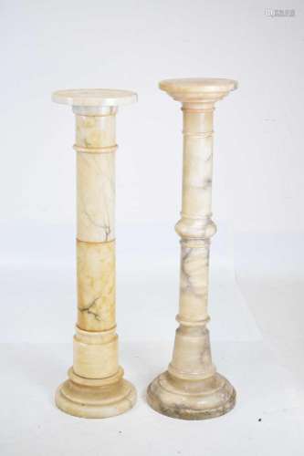 Two similar sectional veined alabaster pedestals