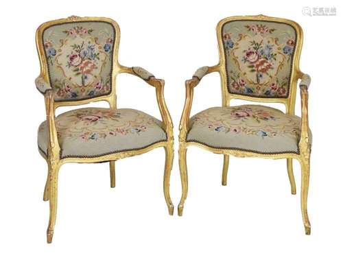 Pair of early 20th Century giltwood open armchairs or fauteu...