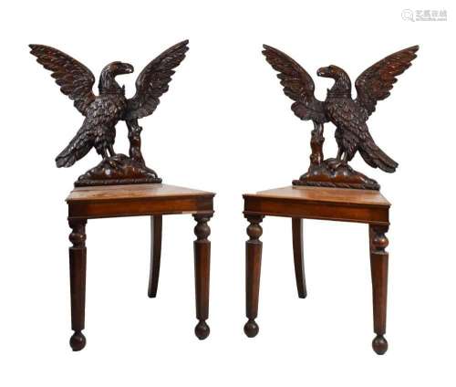 Pair of Victorian carved oak armorial hall chairs