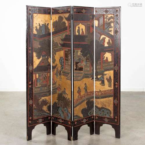 A Chinese room divider, folding screen with lacquered decors...