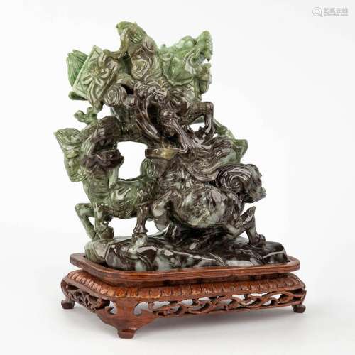 A Chinese sculptured jade with mythological figurines. 20th ...