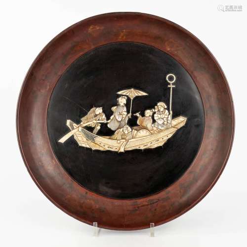 A Japanese bowl inlaid with bone and mother of pearl in lacq...