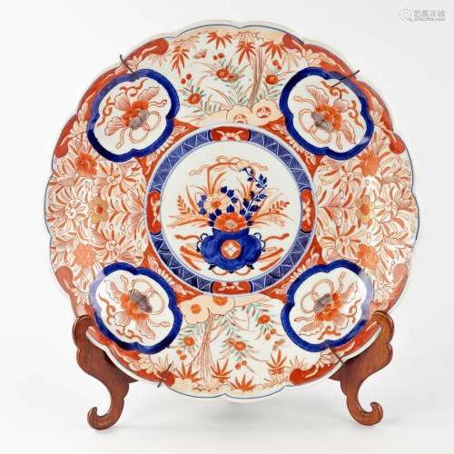 A large Oriental display plate with Imari decor. 19th centur...