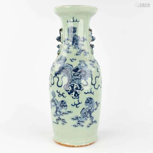 A Chinese celadon vase, decorated with a foo dog. 19th/20th ...