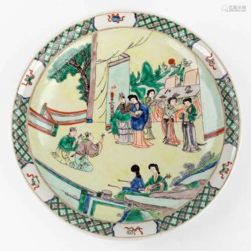 A Chinese Famille Verte plate, decorated with symbols of hap...