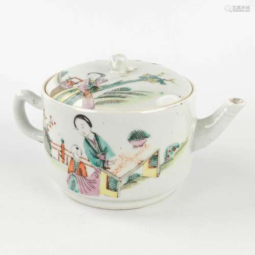 A Chinese teapot decorated with a lady and child, 19th/20th ...
