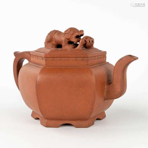 A Chinese teapot made of Yixing Stoneware, 19th/20th century...