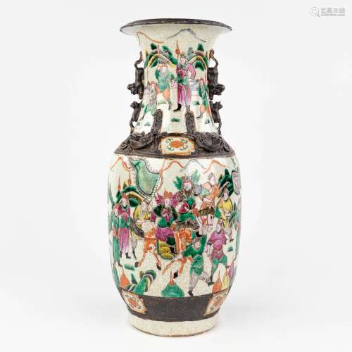 A Chinese Nanking stoneware vase, decorated with warriors. 1...