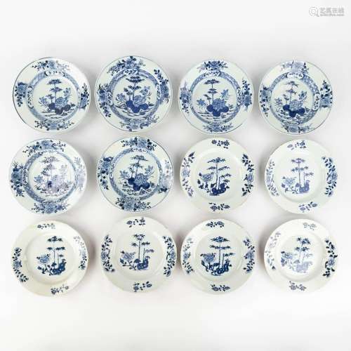 A collection of 12 Chinese plates with a blue-white decor. 1...