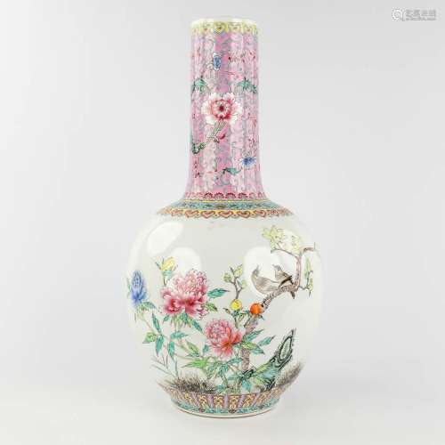 A Chinese vase decorated with fauna and flora. 20th C. (H: 5...