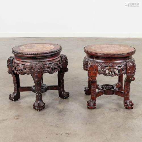 A pair of Chinese hardwood pedestals with a marble top. (L: ...