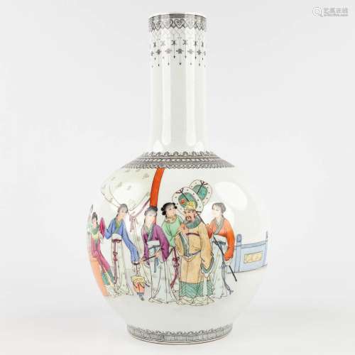 A Chinese vase with hand-painted decor of the Emperor with l...