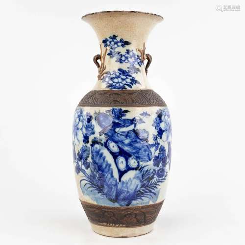 A Chinese vase, Nanking stoneware with blue-white decor. 20t...
