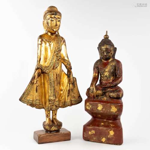A collection of two wood-sculptured buddha statues, 19th/20t...