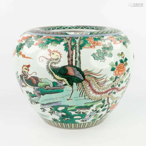 A large Chinese Famille Verte Cache-pot, decorated with cran...