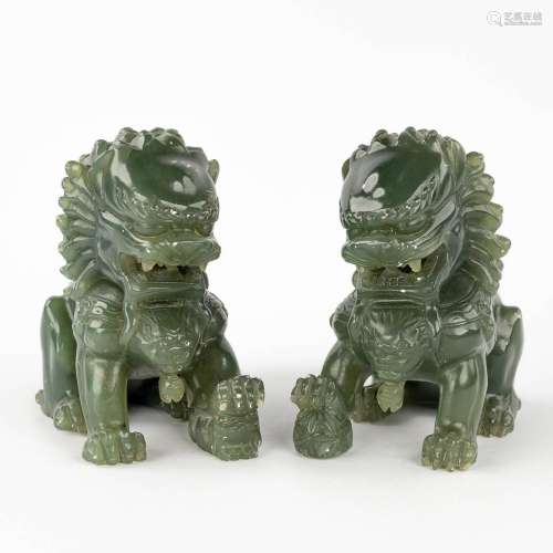 A pair of sculptured hardstone Chinese foo lions. (L: 7,5 x ...