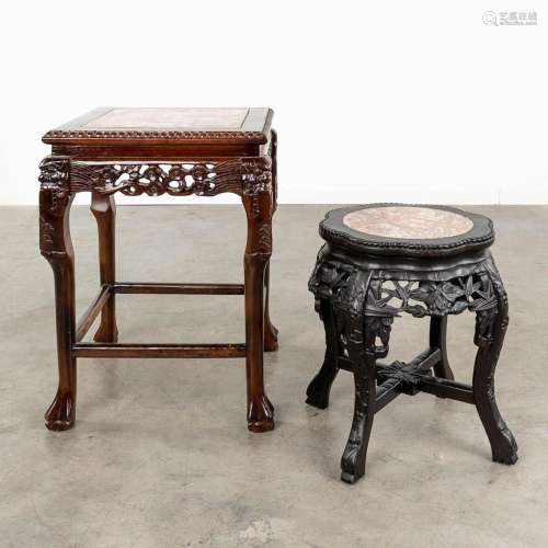 A set of 2 Chines hardwood side tables with a marble top. (L...