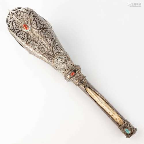 An Oriental Procession staff, silver and bone, finished with...