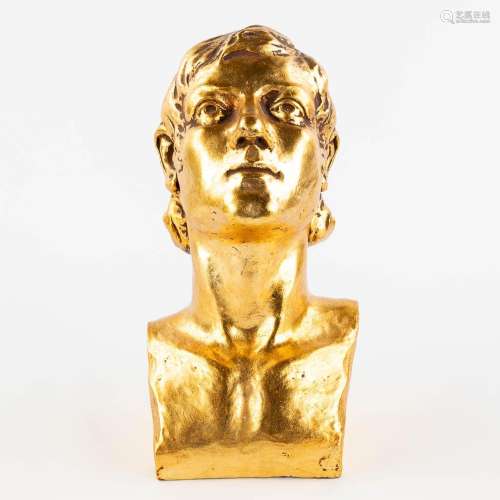 A gold-glazed terracotta buste, marked G. De La Soit. 1931. ...