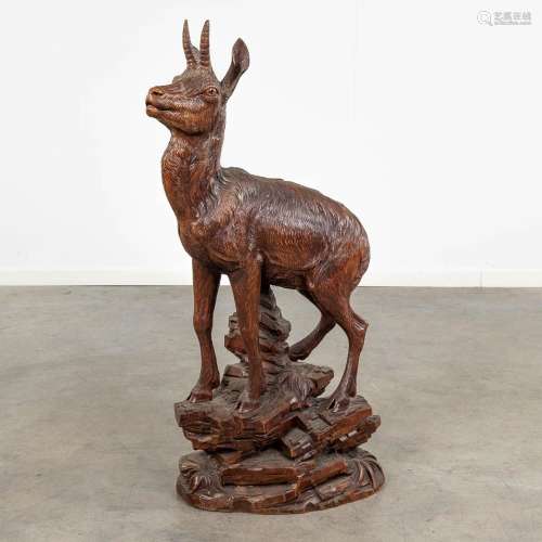 A wood-sculptured figurine of an Ibex, Schwartzwald or Switz...