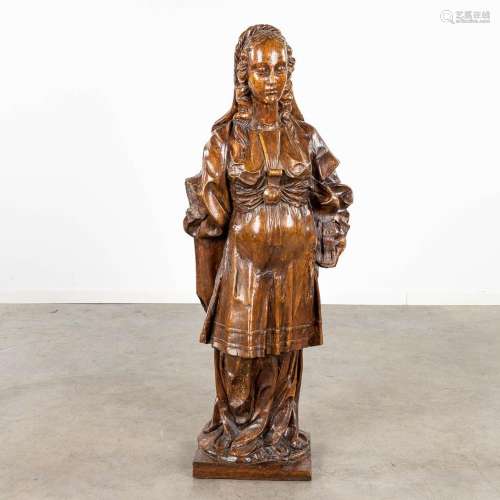 An antique wood sculpture, a figurine of a noble lady. 17th/...