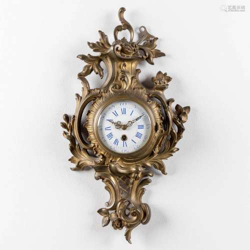 A cartel clock, bronze in Louis XV style. 20th C. (W: 30 x H...