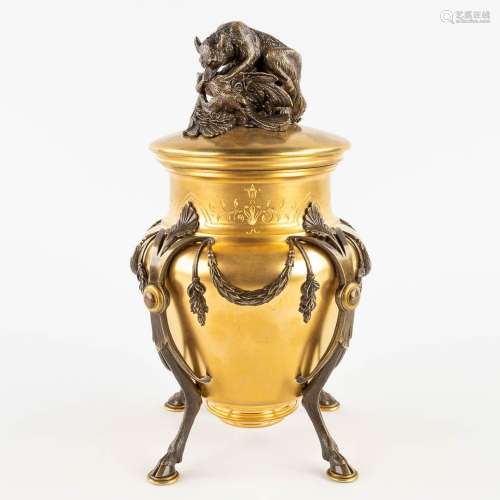 An ice-pail, gilt and patinated bronze decorated with a Wolf...