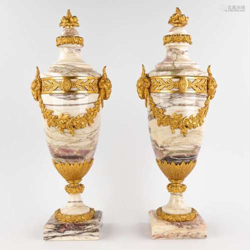 A pair of gilt bronze mounted cassolettes, ram's heads in Lo...