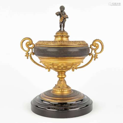 An antique trophy, made of gilt and patinated bronze. 19th C...