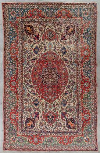 An antique hand-made Oriental carpet, Isphahan. (L: 217 x W:...