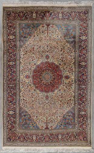 An Oriental hand-made carpet, flower decor, Tabriz. (L: 245 ...